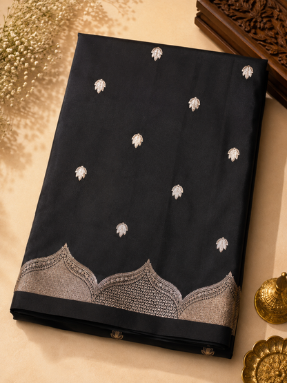 Banarasi Blended Satin Saree – Black with Silver Zari Leaf Butti Ornate Pallu