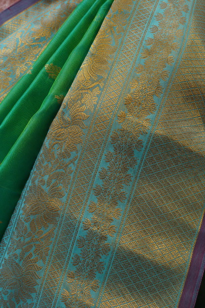 Gadwal Silk Saree – Emerald Green with Sky Blue Zari Border