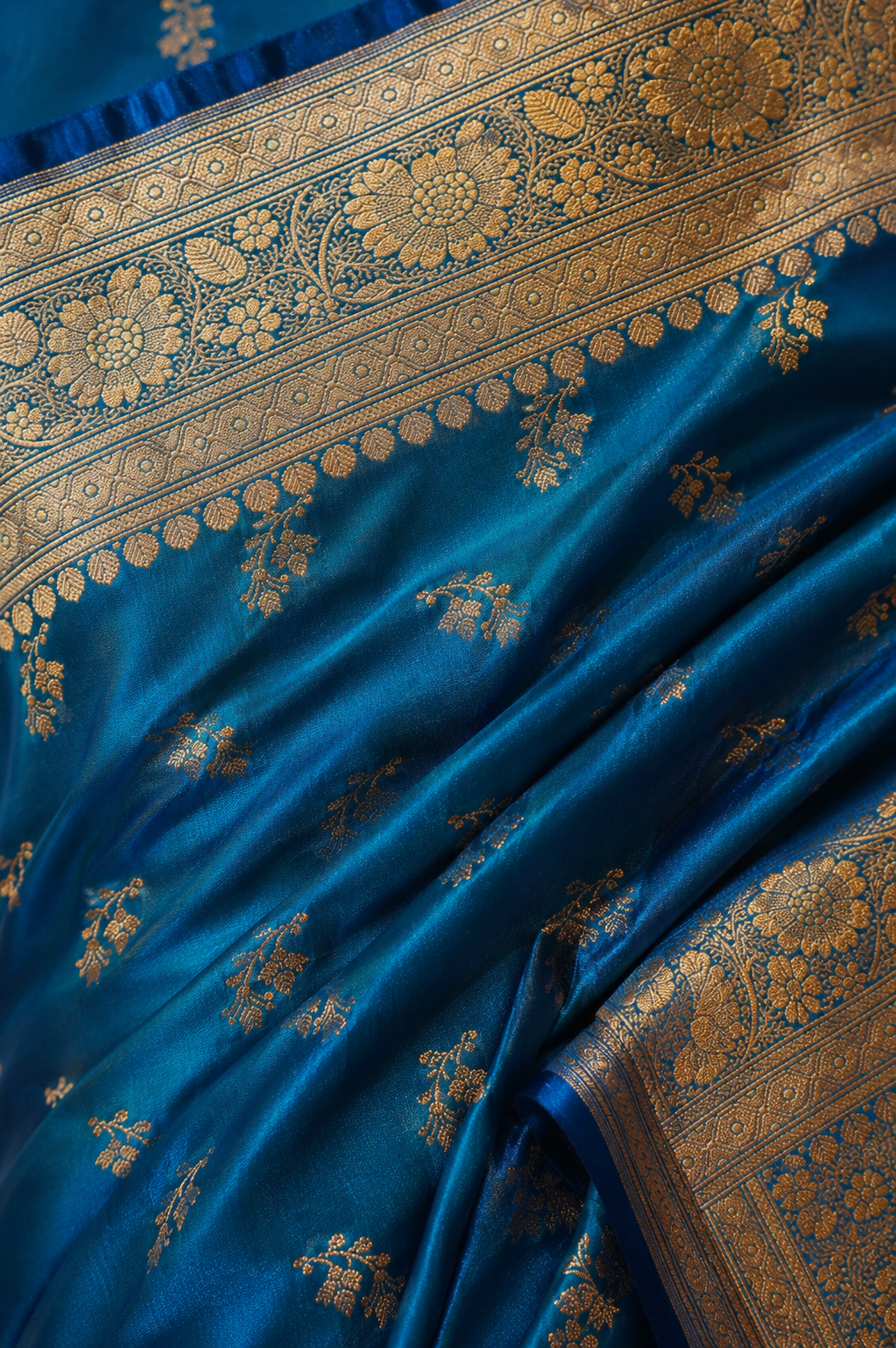 Banarasi Silk Saree in Peacock Blue with Antique Gold Zari Weaving