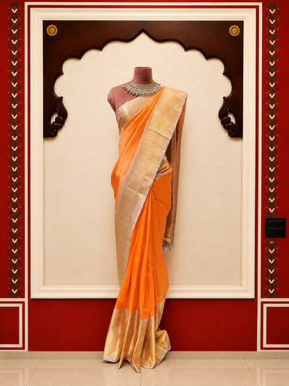 Gadwal Silk Saree – Peach Orange with Silver-Gold Zari Border & Rich Pallu